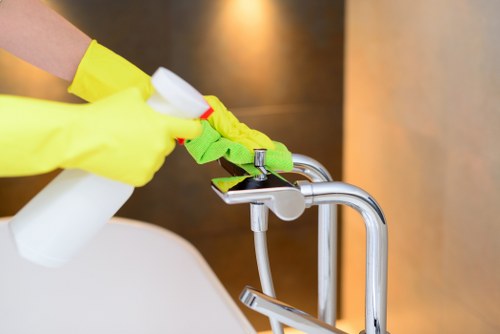 Technician treating a pet stain in a Richmond home carpet